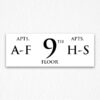 Apartment Number Sign in Black Text