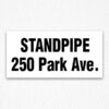 Standpipe 250 Park Ave. Sign in Black Text